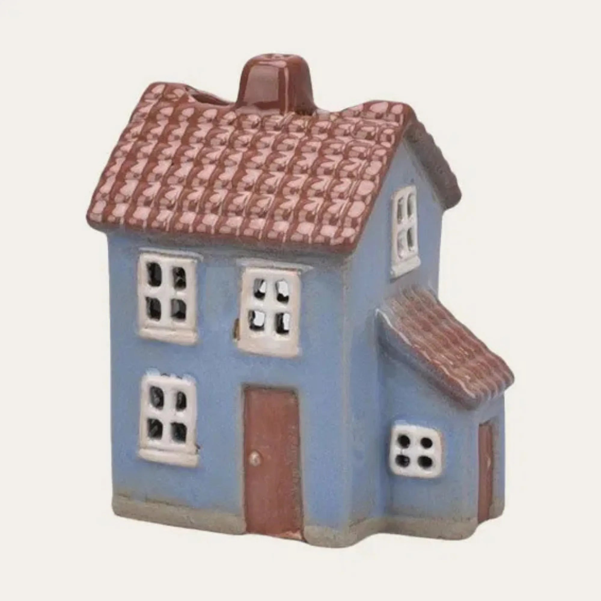 det gamle apotek lichthaus blau mit braunem dach und anbau anna und ole shop