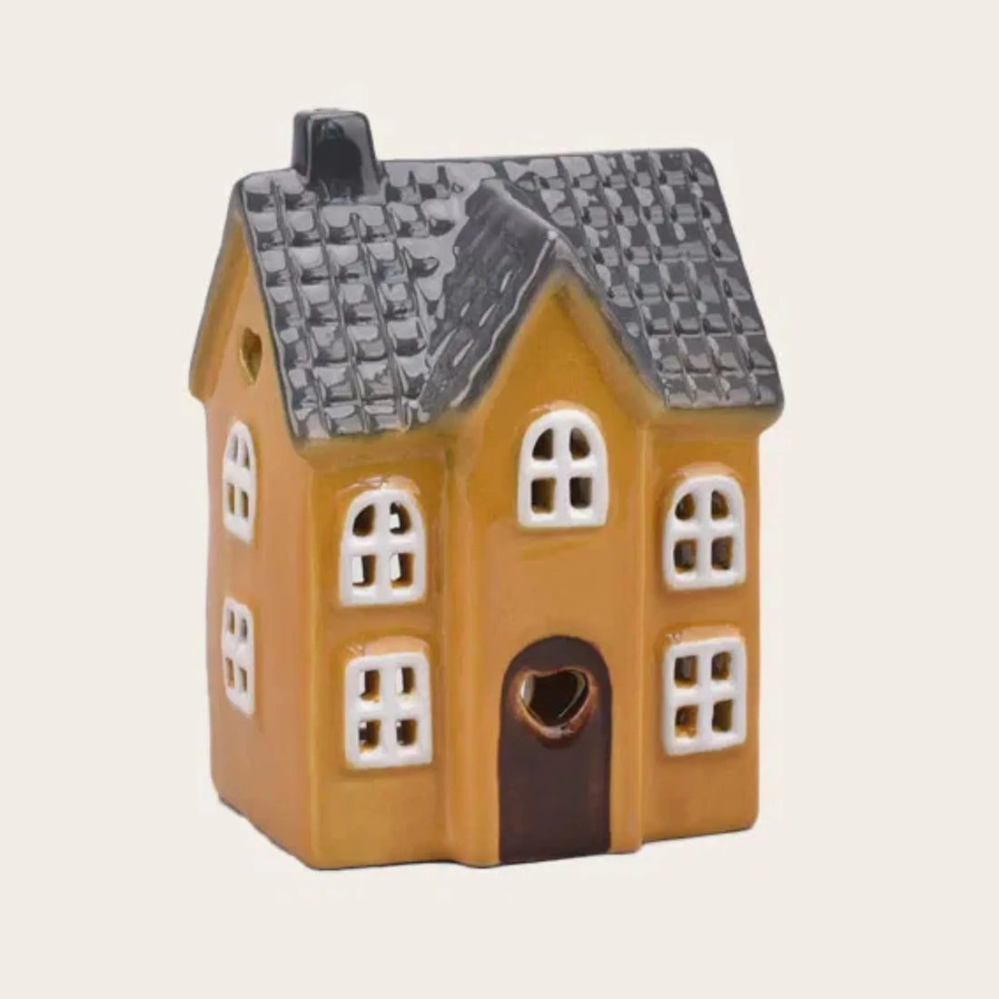 det gamle apotek lichthaus gelb schwarz mit herzfenstern mit anbau anna und ole shop